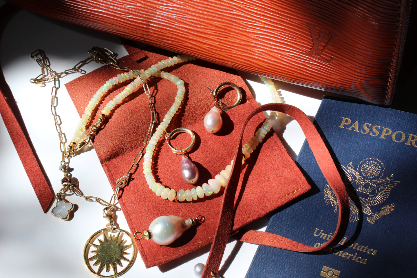 Travel Edit with ZD travel pouch, Essential Oblong Chain, Charms and hoops